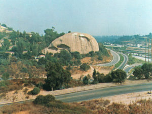 The Eagle Rock High School Jazz Band celebrated the designation of the rock in the mid 1960’s with a series of note-cards. The 134 freeway had been completed, at left, discharging into Colorado Boulevard. Eagle Vista Avenue is in the foreground. (ERHS Jazz Band-ERVHS)