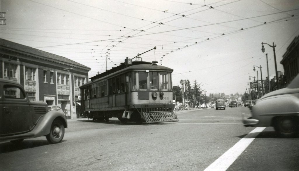 This more realistic view captures a streetcar surrounded by car traffic as it turns south on Eagle Rock. (Alan Weeks photograph)
