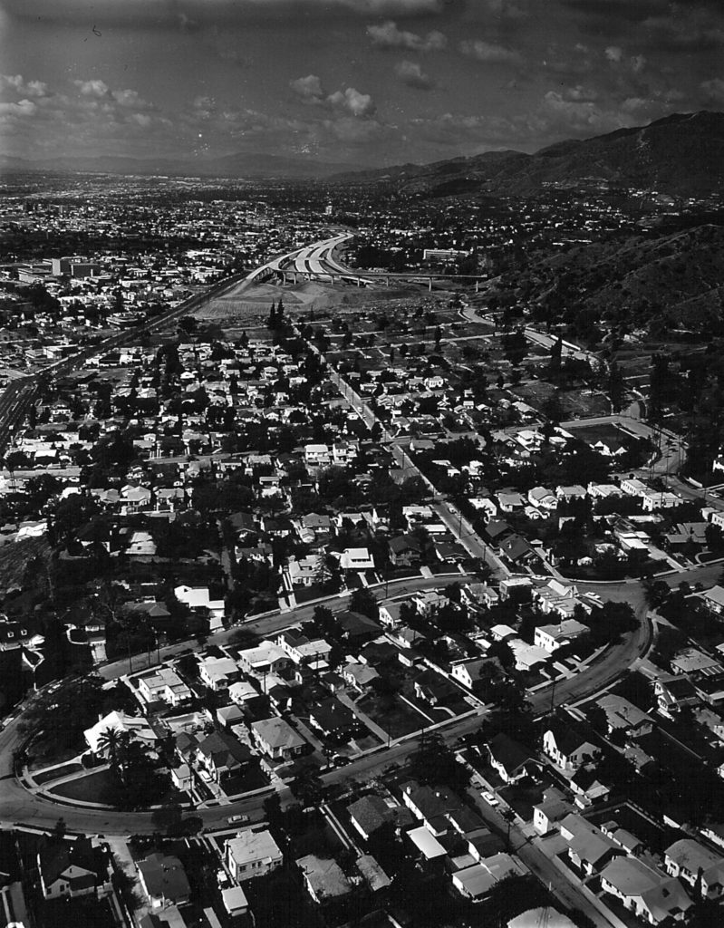 This 1969 aerial view shows the freeway aimed squarely at Las Flores Drive. The portion through Glendale had already been completed. (Photo by Joe Friezer-Occidental college Library Special Collections Friezer Collection)