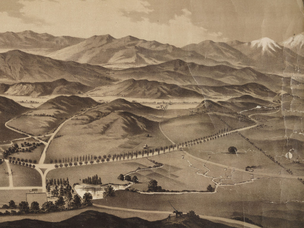 This fantasy view of the railway route shows it proceeding from Garvanza, the nearest rail head, to its terminus in the center distance in the farming hamlet of Eagle Rock. The road from center left through a nonexistent pass toward Pasadena was never built. The lake and farmhouse in the lower left belonged to Andrew Glassell as did the land depicted in the lower portion of the illustration. The lake and stream complicated the path to Los Angeles on the route which would later become Eagle Rock Boulevard. (Vintage Advertisement-Huntington Library)