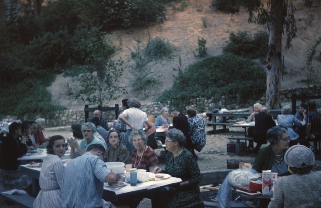The society and community met at the picnic grounds near the Sylvan Theater in Yosemite Park for the annual potluck. The annual Ice Cream Social superseded this yearly event as a get together and celebration of the community. (probably John Miller -ERVHS)
