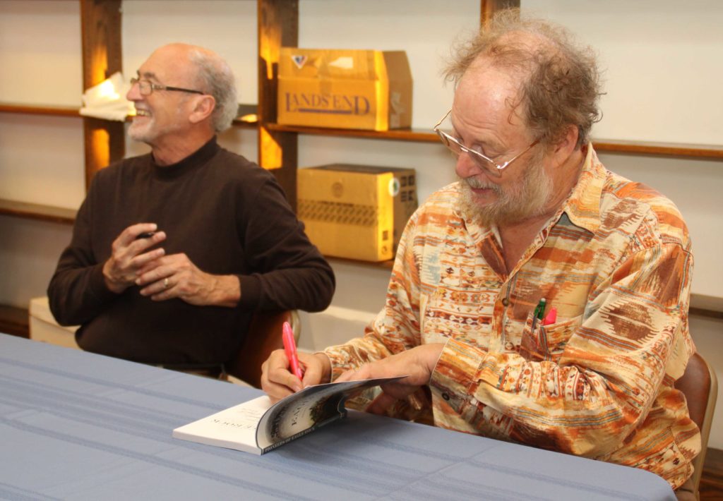 Past presidents Frank Parrello and Eric Warren sign “Pioneers of Eagle Rock” the book they edited. This was the third book on Eagle Rock History published based largely on materials collected by ERVHS. (A. C. Strange-ERVHS)