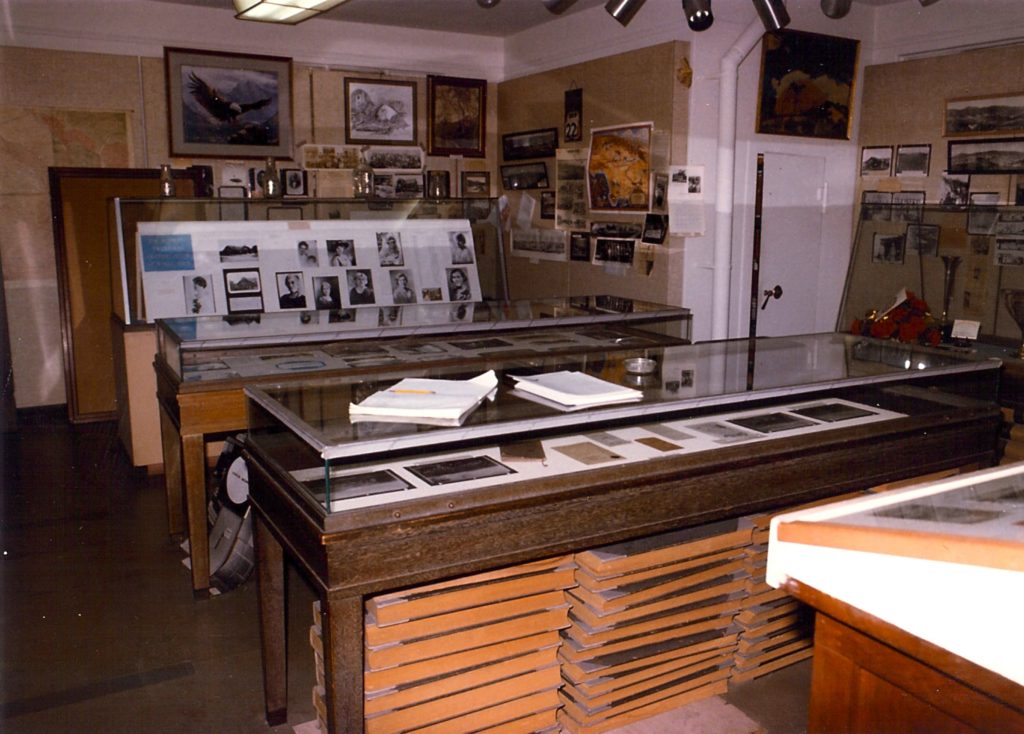 The ERVHS museum in 1985. Many original photographs and artworks were displayed in an effort to educate the public about Eagle Rock’s history. As can be seen storage for the collection was scarce. The display cases in the foreground were donated to the society by the Southwest Museum. The bound newspapers were from the Glendale News Press that had been de-accessioned from the Glendale Public Library. They have since been returned there. (John Miller-ERVHS)